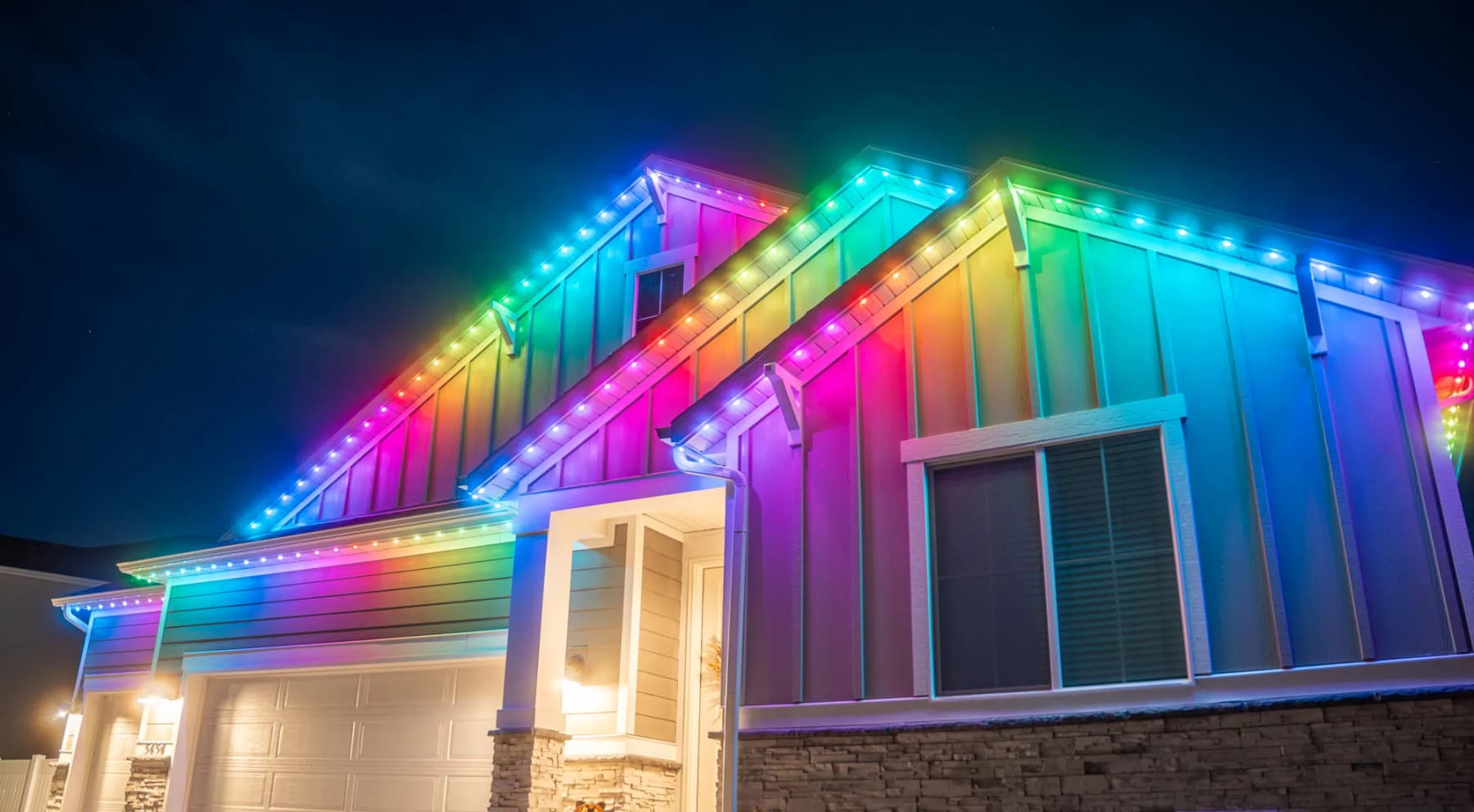 Permanent LED track lighting running the full width of a home